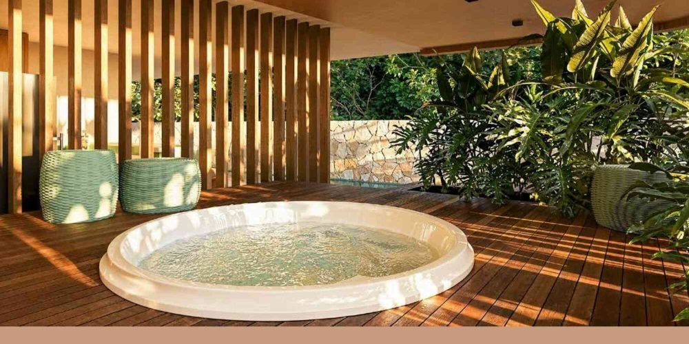 Fachada moderna do Panorama Jardim Oceânico com design assinado por Afonso Kuenerz, no coração da Barra da Tijuca
