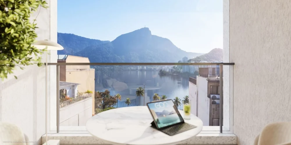 Rooftop do Goa Ipanema Studios com lounge e vista para o Cristo Redentor